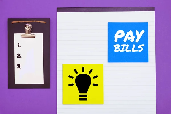 Text sign showing Pay Bills, Word for list of expenses to be paid total amount costs or expenses