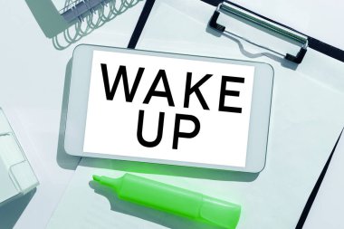 Uyanın, İş gezisi, uyanan ya da uyanan bir kişinin örneğini gösteren metin işareti