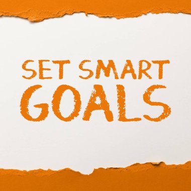 El yazısı işareti Akıllı Hedefler Belirle, İş konsepti Ulaşılabilir hedefler belirle İyi iş planları yap