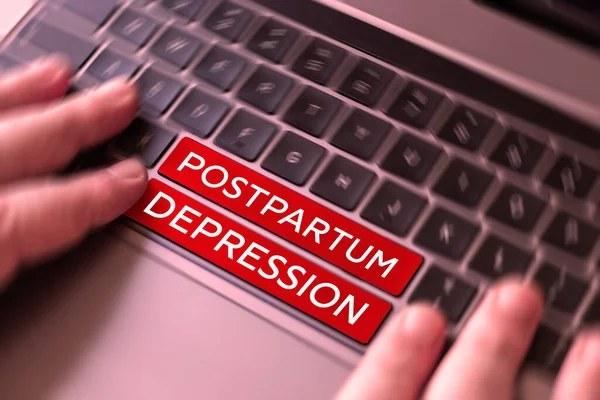 Hand writing sign Postpartum Depression, Concept meaning a mood disorder involving intense depression after giving birth