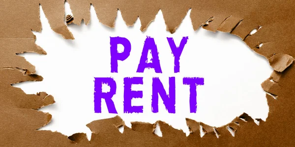 Conceptual caption Pay Rent, Word for To pay money in exchange for the use of someone elses property
