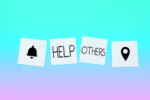 Text sign showing Help Others, Internet Concept the action of helping someone to do something or assistance