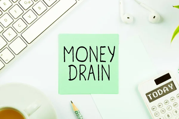 Sign displaying Money Drain, Internet Concept To waste or squander money Spend money foolishly or carelessly