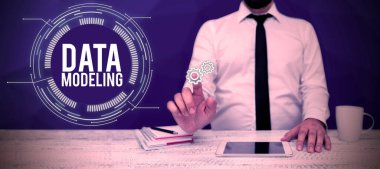 Veri depolama sistemleri arasında veri transferi için metin Data Modellemesi, Kavramsal fotoğraf süreci yazılıyor