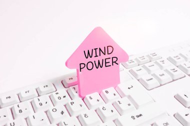 Jeneratörleri çalıştırmak için mekanik güç sağlayan hava akımının iş konseptini gösteren tabela