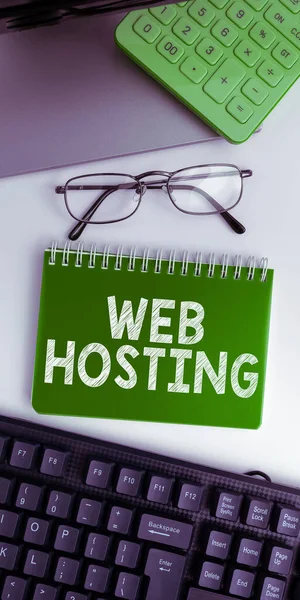 Handwriting text Web Hosting, Concept meaning The activity of providing storage space and access for websites