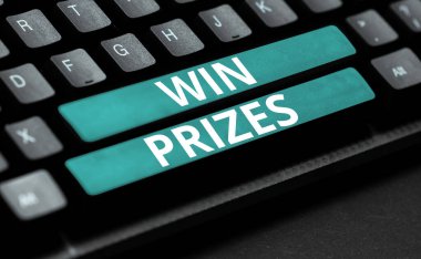 İlham, bir yarışmada ya da yarışmada zafer için verilen ödülleri gösteriyor.