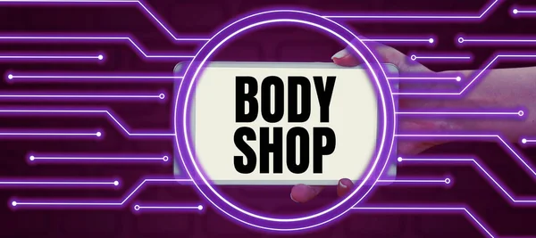 Text sign showing Body Shop, Business idea a shop where automotive bodies are made or repaired