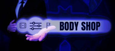 Tabelacı dükkanını, iş yerini gösteren bir ilham kaynağı. Otomotiv cesetlerinin yapıldığı ya da tamir edildiği bir dükkan.