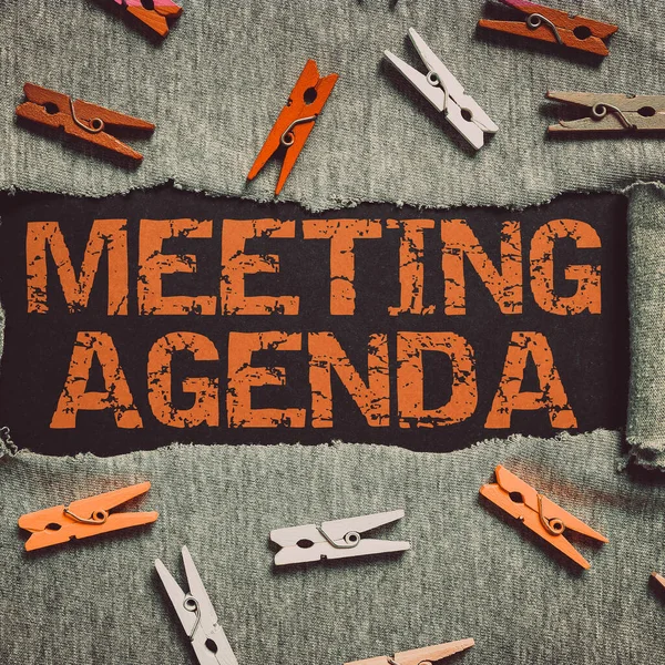Sign displaying Meeting Agenda, Business concept An agenda sets clear expectations for what needs to a meeting