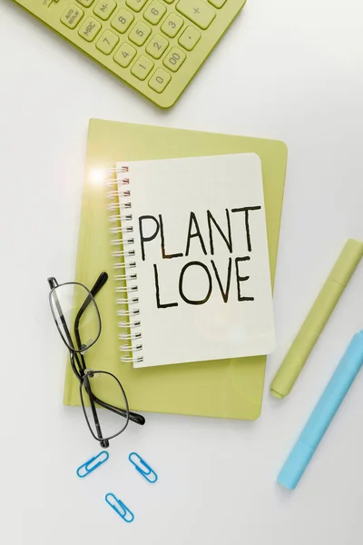 stock image Text caption presenting Plant Love, Business overview a symbol of emotional love, care and support showed to others