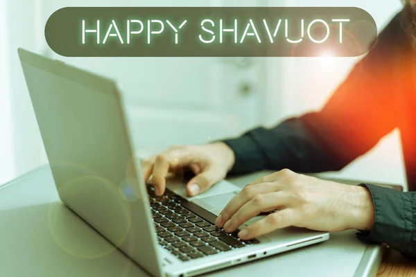 Hand writing sign Happy Shavuot, Business concept Jewish holiday commemorating of the revelation of the Ten Commandments
