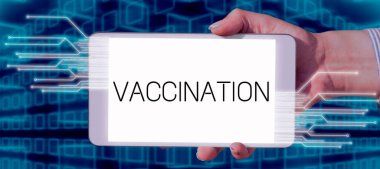 Text caption presenting Vaccination, Business concept Treatment which makes the body stronger against infection