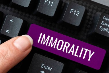 Ahlaksızlığı, kavramsal fotoğrafı, ahlaksızlığı veya ahlaksızlığı gösteren bir tabela.