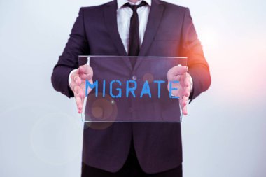 Text showing inspiration Migrate, Business concept to move or travel from one country place or locality to another
