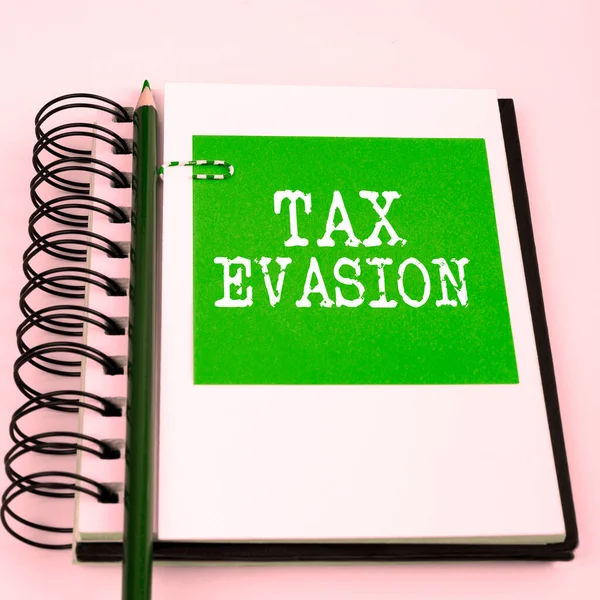Text sign showing Tax Evasion, Business approach the failure to pay or the deliberate underpayment of taxes