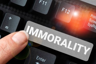 Ahlaksızlığı, ahlaksızlığı veya ahlaksızlığı gösteren bir işaret.