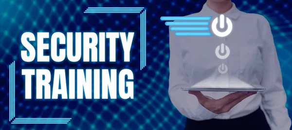 Hand writing sign Security Training, Word for providing security awareness training for end users