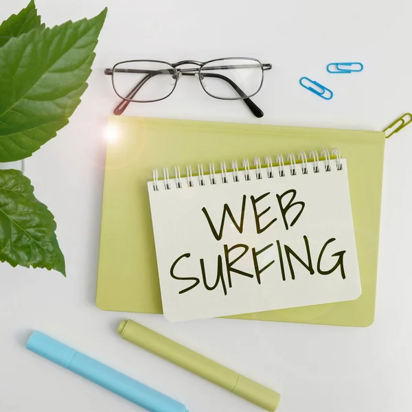 Hand writing sign Web Surfing, Word for Jumping or browsing from page to page on the internet webpage