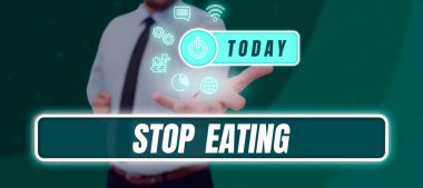 Hand writing sign Stop Eating, Business showcase cease the activity of putting or taking food into the mouth