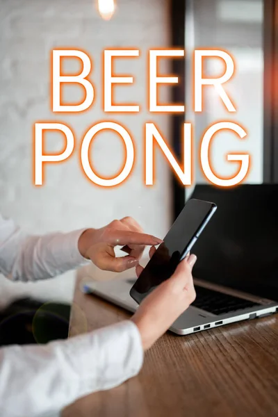 Text sign showing Beer Pong, Internet Concept a game with a set of beer-containing cups and bouncing or tossing a Ping-Pong ball
