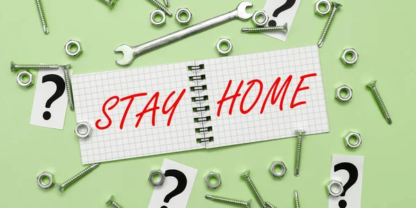 Hand writing sign Stay Home, Business idea not go out for an activity and stay inside the house or home