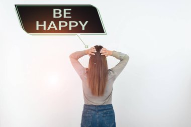 Text caption presenting Be Happy, Conceptual photo live every moment as the last love your life work family