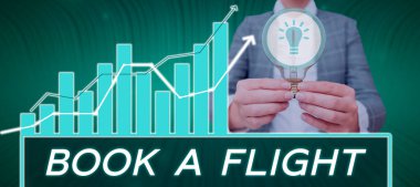 Sign displaying Book A Flight, Concept meaning Purchase tickets to make a trip by plane Planning vacations