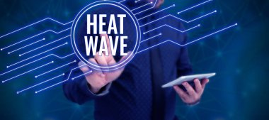 Text caption presenting Heat Wave, Word Written on a prolonged period of abnormally hot weather