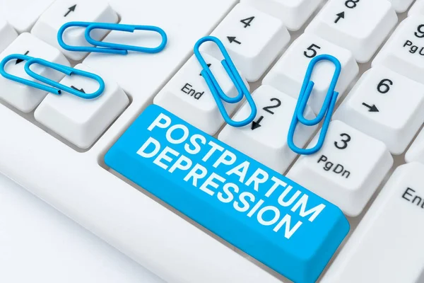 Writing displaying text Postpartum Depression, Internet Concept a mood disorder involving intense depression after giving birth