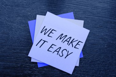 Hand writing sign We Make It Easy, Business approach Offering solutions alternatives make an easier job ideas