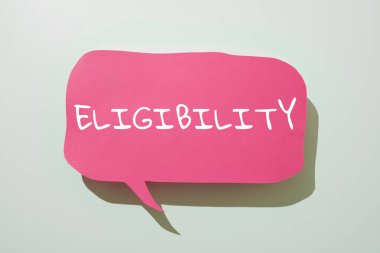 Hand writing sign Eligibility, Concept meaning State of having the right for doing or obtain something Proper