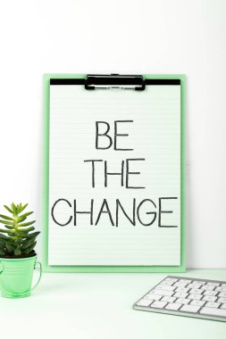Writing displaying text Be The Change, Business overview Make things to obtain success develop yourself and company