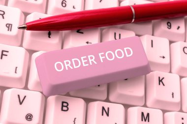 Sign displaying Order Food, Business approach the process of requesting a preferred food in a restaurant