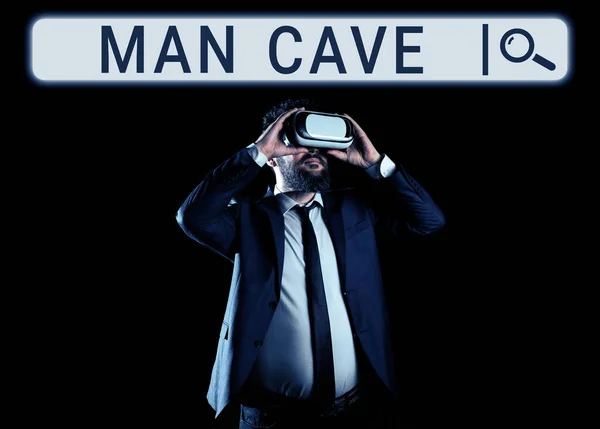 Conceptual caption Man Cave, Concept meaning a room, space or area of a dwelling reserved for a male person