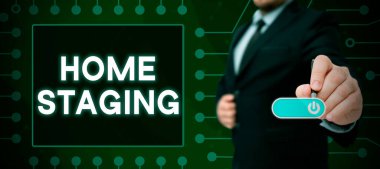 Sign displaying Home Staging, Business concept preparation of a private residence for sale in the real estate marketplace