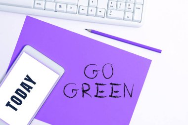 Text showing inspiration Go Green, Word for making more environmentally friendly decisions as reduce recycle
