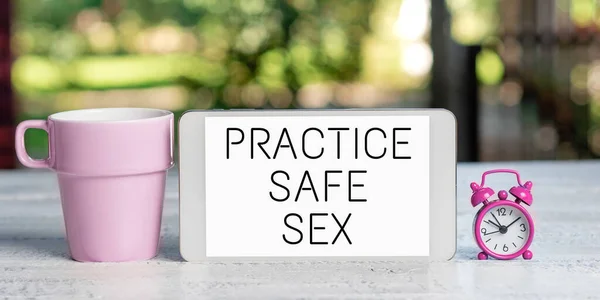 Text caption presenting Practice Safe Sex, Internet Concept intercourse in which measures are taken to avoid sexual contact disease