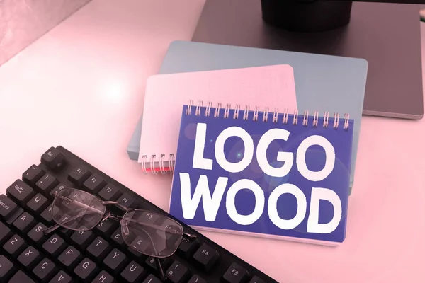 Conceptual caption Logo Wood, Business concept Recognizable design or symbol of a company inscribed on wood