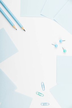 Notebook and Colored Papers Stickers Lying On Desk. Collection Stationery.