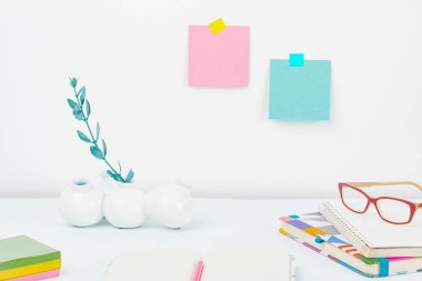 Office Supplies Over Desk. Keyboard and Glasses. Assorted School Utilities