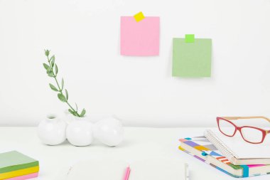 Office Supplies Over Desk. Keyboard and Glasses. Assorted School Utilities
