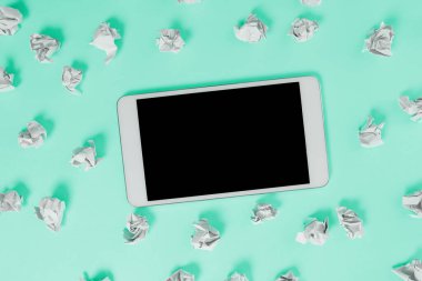 Important Message Presented On Phone On Desk With Paperwraps, Paper