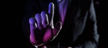 Man Holding Mobile Phone and Point On Recent Updates With One Finger.