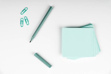 Notebook and Colored Papers Stickers Lying On Desk. Collection Stationery.