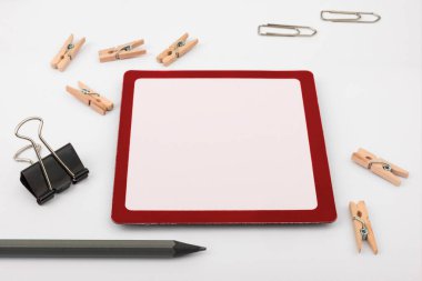 Important Messages. Sticker Lying On White Desk With Clotherspins.