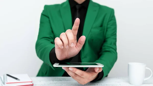 Businessman Green Jacket Sitting Table Holding Mobile Phone —  Fotos de Stock