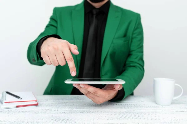 Businessman Green Jacket Sitting Table Holding Mobile Phone —  Fotos de Stock