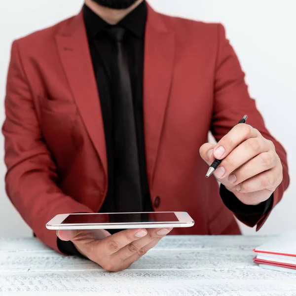 Man Jacket Sitting White Table Pointing Pen Message — Fotografia de Stock