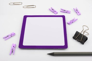 Important Messages. Sticker Lying On White Desk With Clotherspins.